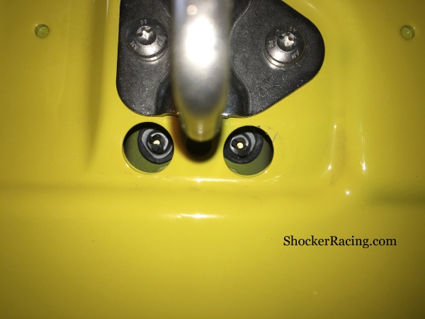 Porsche Cayman 981 Hood Crest Speed Nut Cover Removed to expose Speed Nuts